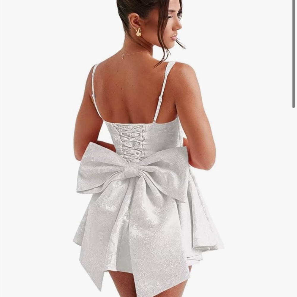 Elegant White Dress with Bow